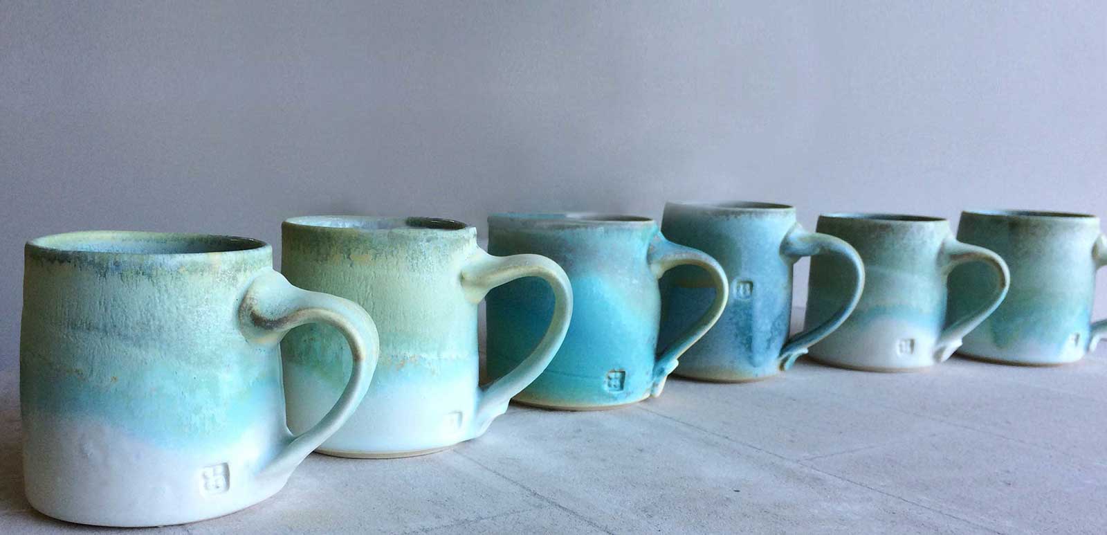 cori sandler row of mugs